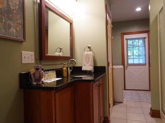 bathroom with vanity and tile patterned floors