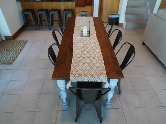 dining area with light tile patterned floors