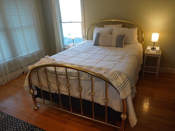 bedroom featuring wood-type flooring