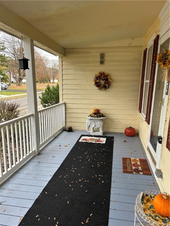 wooden deck featuring covered porch