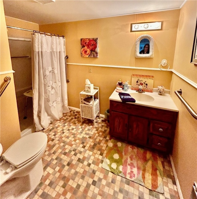 full bathroom with vanity, shower / bath combination with curtain, and toilet