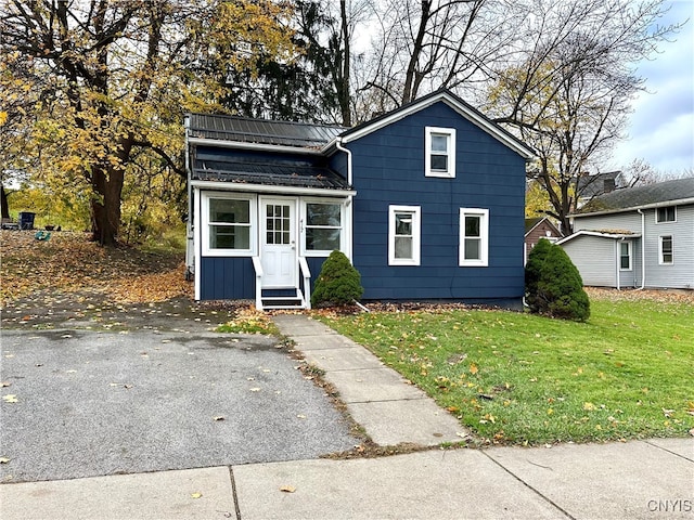 view of front of home with a front yard