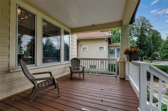 wooden terrace featuring a porch