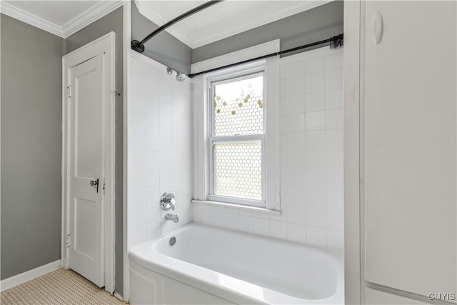 bathroom featuring ornamental molding, tiled shower / bath, and tile patterned floors