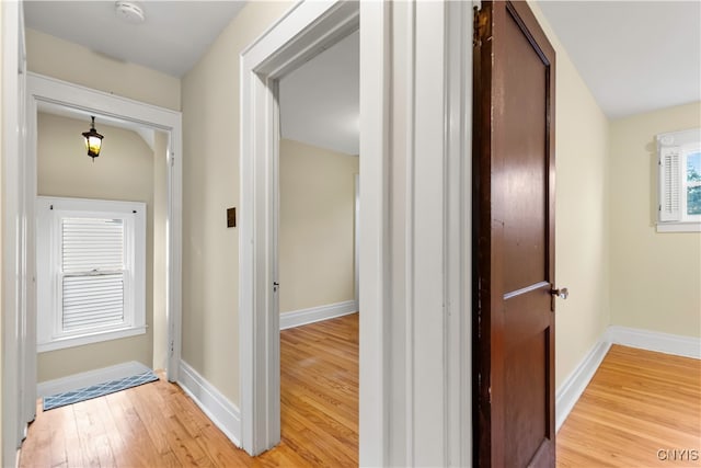 corridor featuring light wood-type flooring