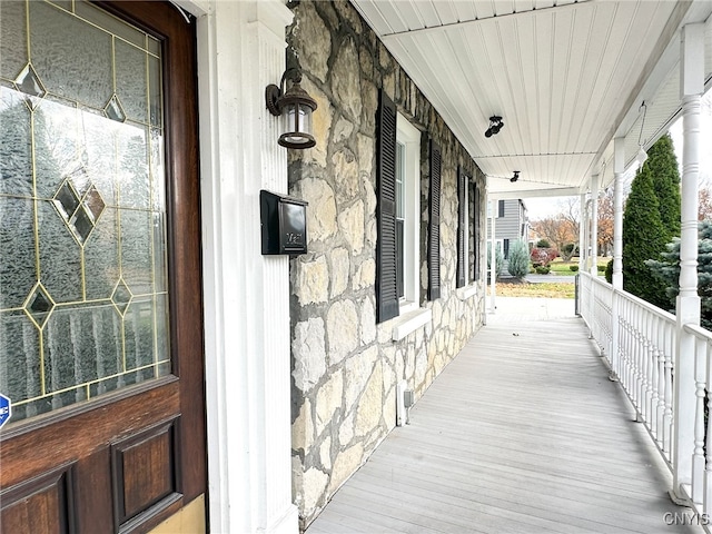 entrance to property with covered porch