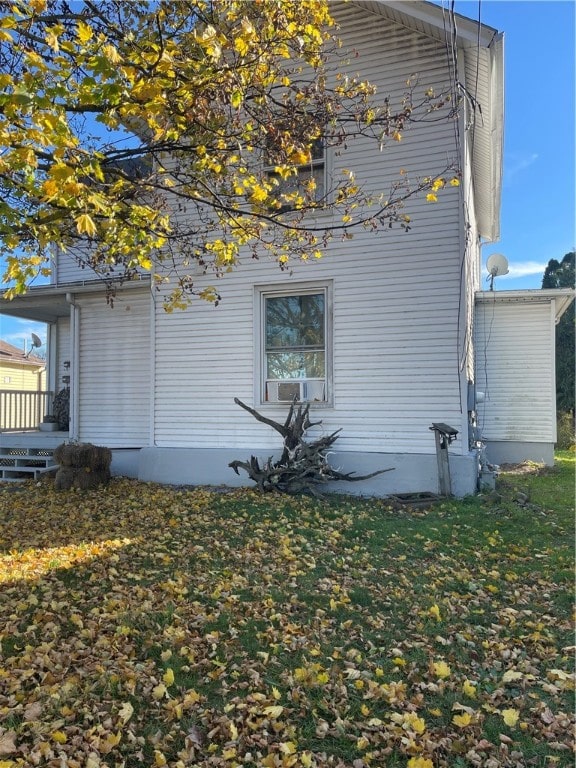 view of home's exterior featuring a yard