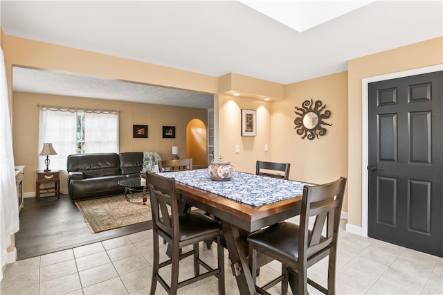 dining area featuring light wood-type flooring