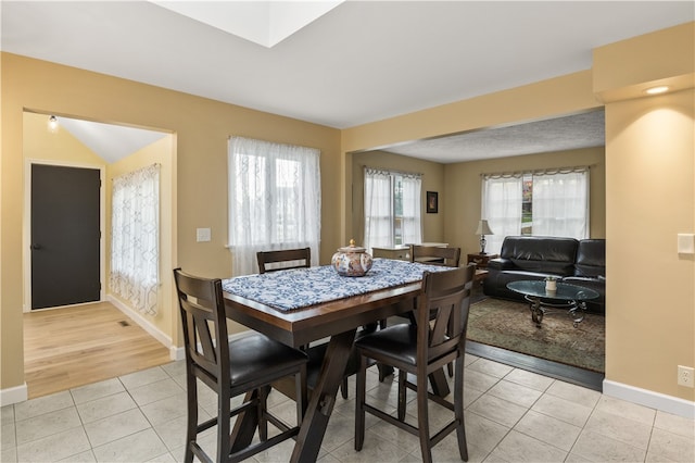 dining space featuring light hardwood / wood-style floors