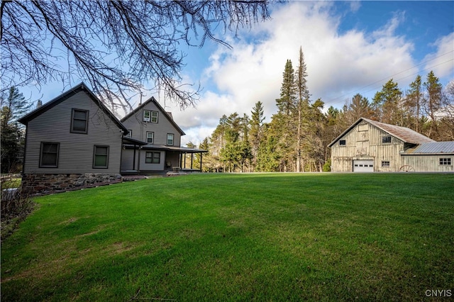 view of yard featuring a garage