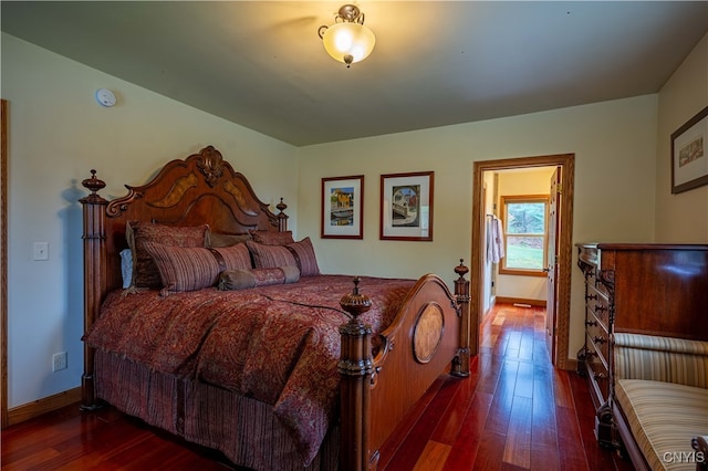 bedroom featuring dark hardwood / wood-style floors