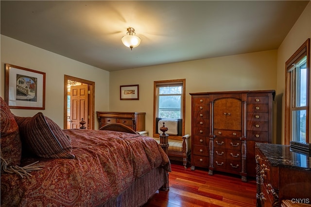 bedroom featuring dark wood-type flooring