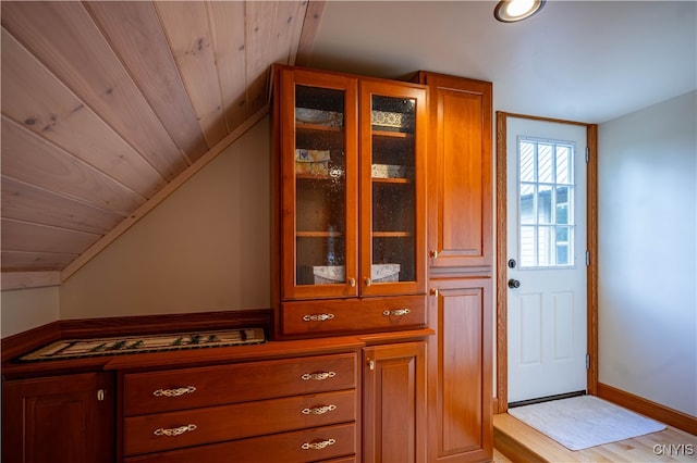 room details featuring wood-type flooring and wooden ceiling