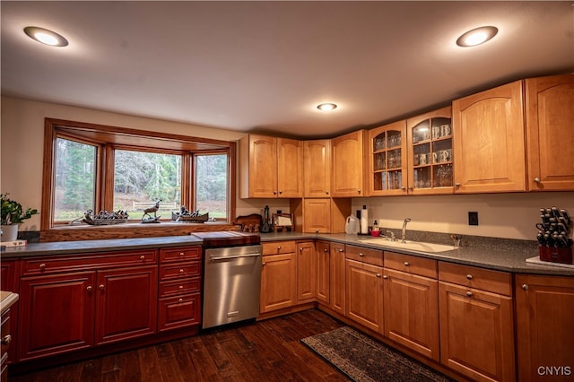 kitchen with dishwasher, dark wood-type flooring, and sink