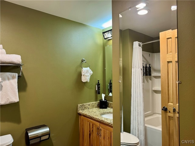 full bathroom featuring toilet, shower / tub combo, and vanity