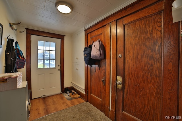 doorway to outside with dark hardwood / wood-style floors