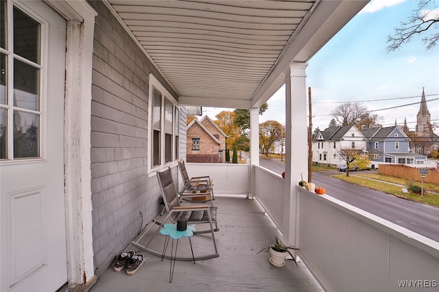 view of patio featuring a porch