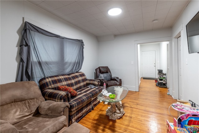 living room with light hardwood / wood-style floors