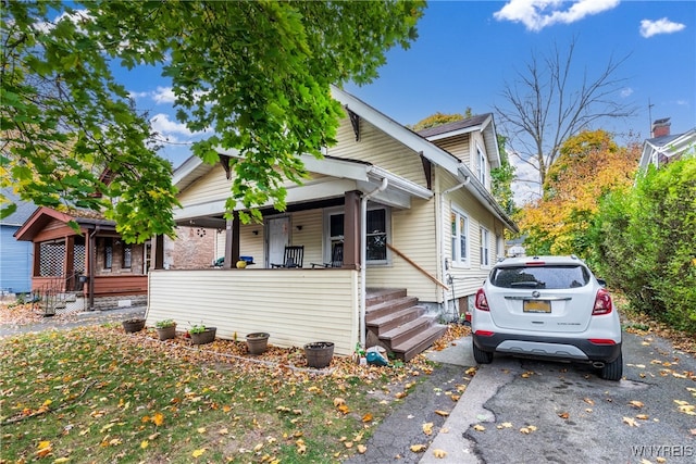 bungalow-style house featuring a porch