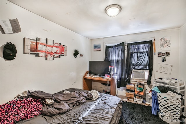 bedroom featuring carpet and cooling unit