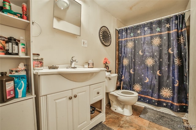 bathroom with vanity, toilet, and a shower with shower curtain