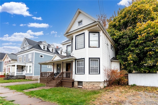 view of front property featuring a porch