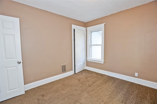 unfurnished bedroom featuring carpet flooring