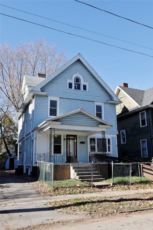 view of front of property featuring covered porch