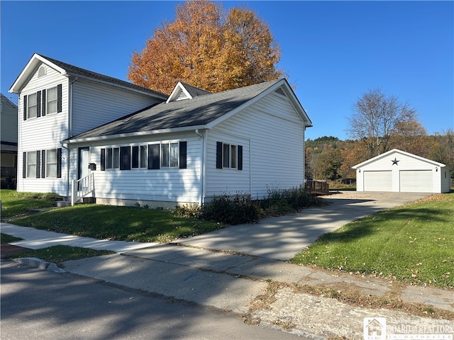 view of home's exterior featuring an outbuilding, a garage, and a lawn