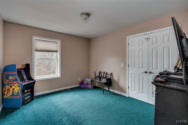 miscellaneous room with carpet floors