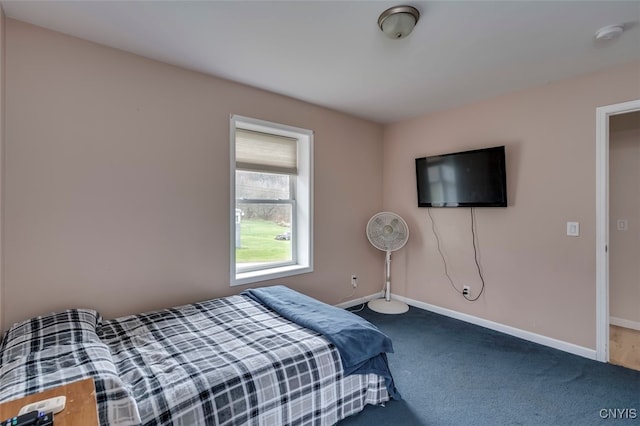 bedroom featuring carpet flooring