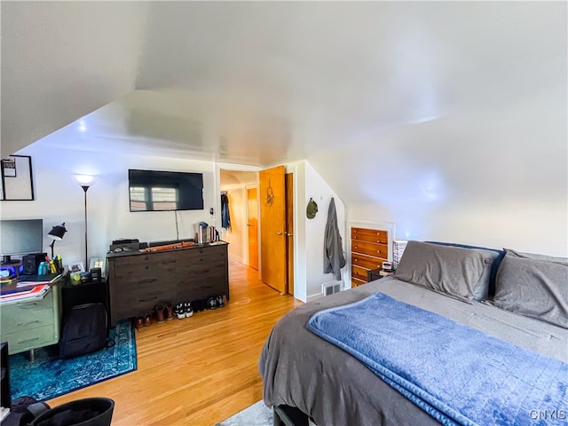 bedroom featuring hardwood / wood-style flooring