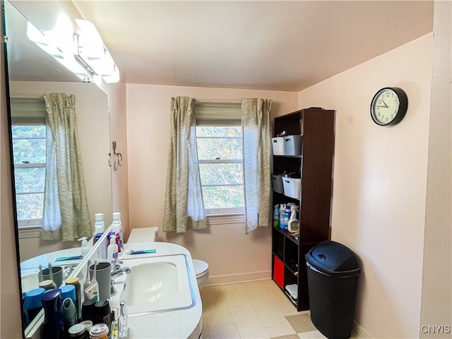 bathroom with sink and toilet