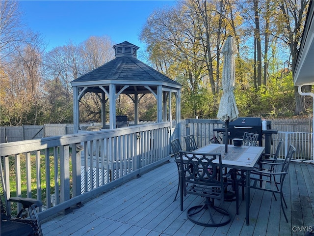 wooden terrace with a gazebo