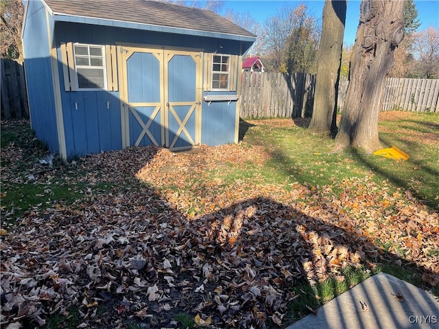 exterior space featuring a storage unit