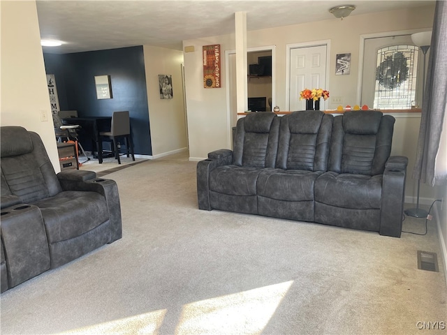 living room featuring light colored carpet