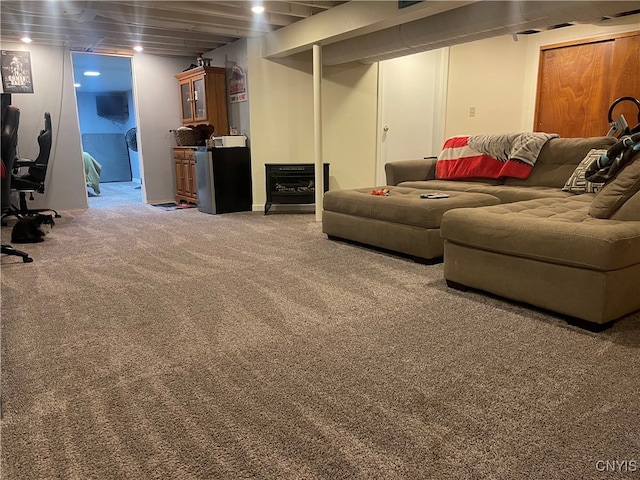 living room featuring wood ceiling and carpet floors