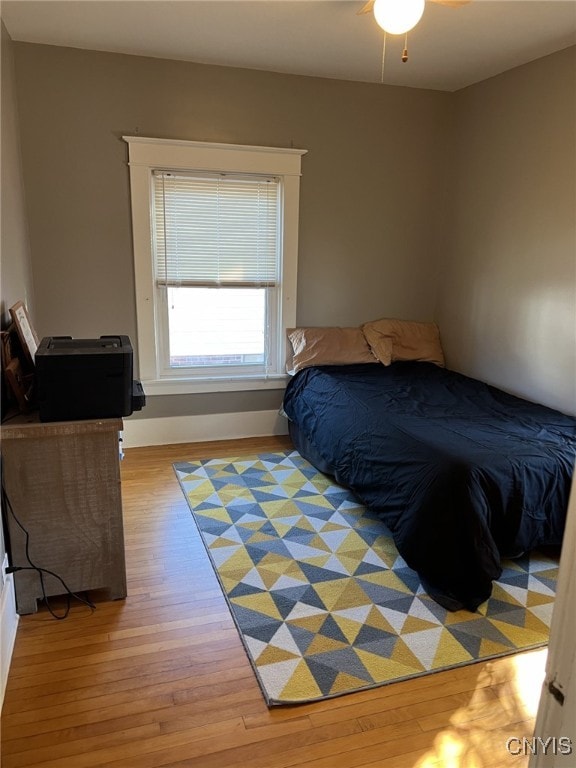 bedroom with light wood-type flooring