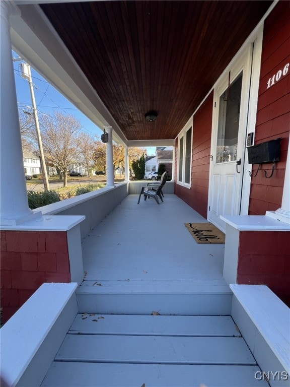 wooden deck featuring a porch