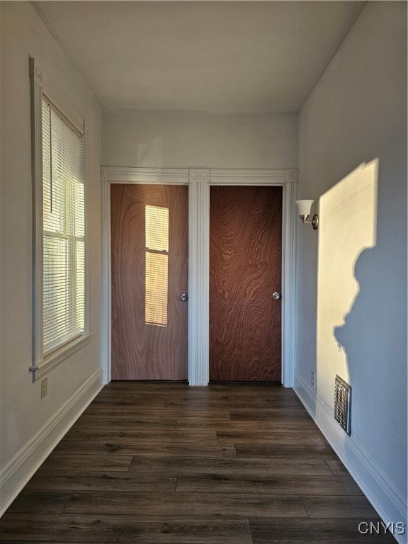 interior space featuring dark wood-type flooring