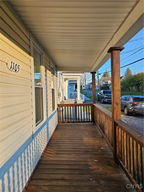 wooden deck featuring a porch