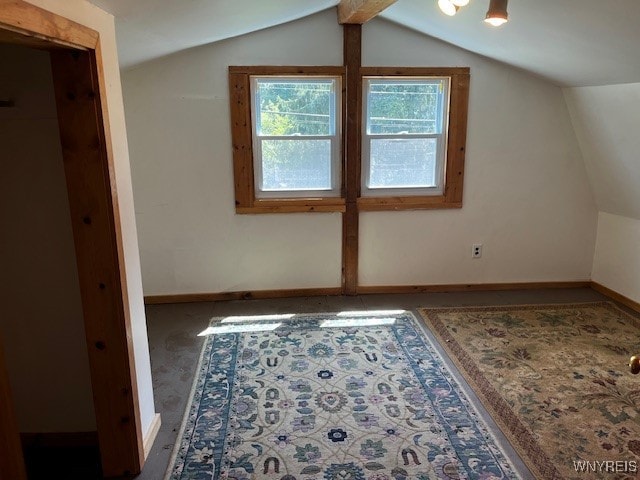 bonus room featuring vaulted ceiling