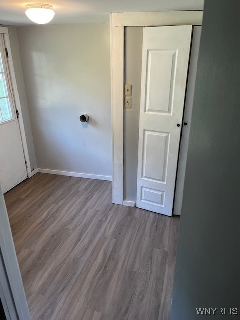 unfurnished room featuring light hardwood / wood-style flooring