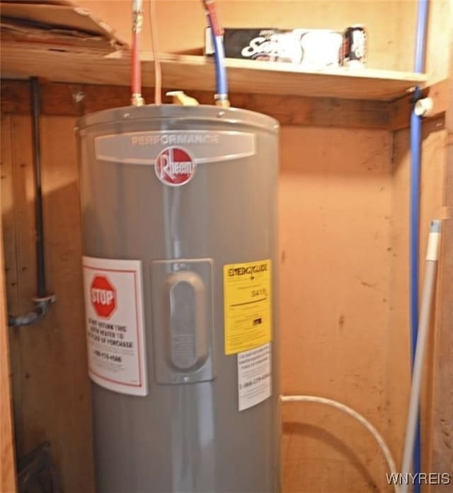 utility room featuring electric water heater