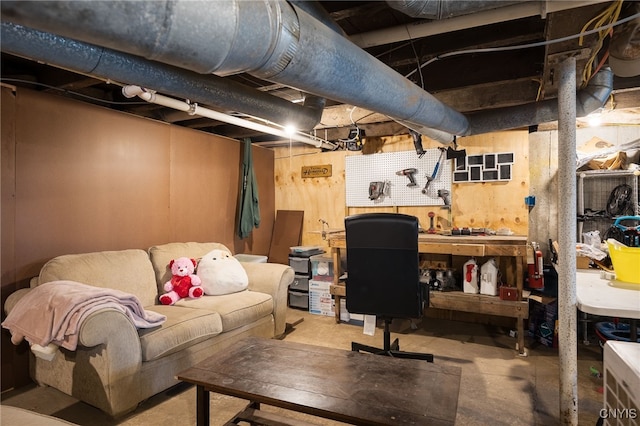 basement with a workshop area