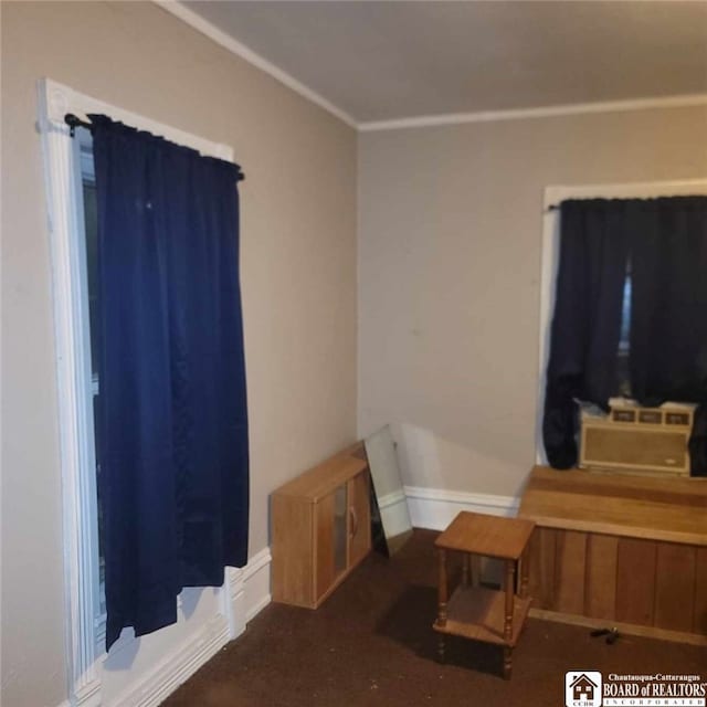 living room with ornamental molding