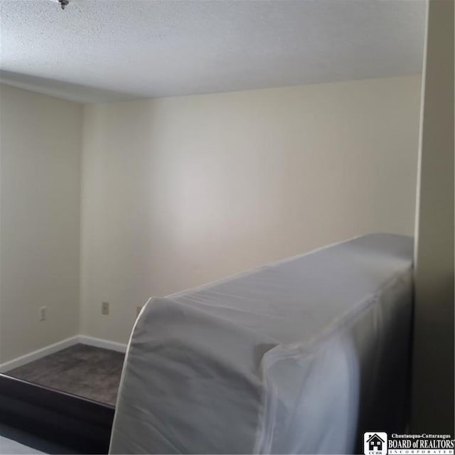 bedroom with a textured ceiling