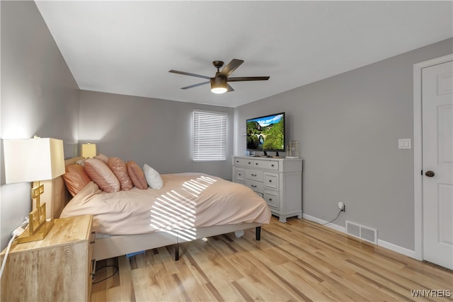 bedroom featuring light wood-type flooring and ceiling fan