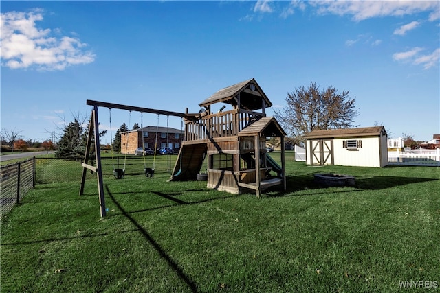 view of jungle gym with a shed and a lawn