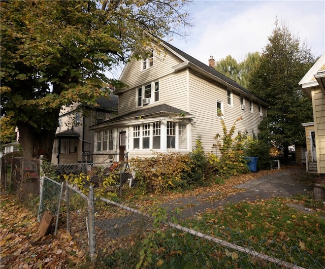 exterior space featuring a sunroom